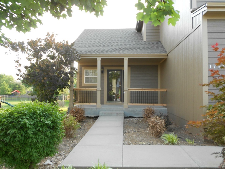 New handrails and spindles installed on porch.